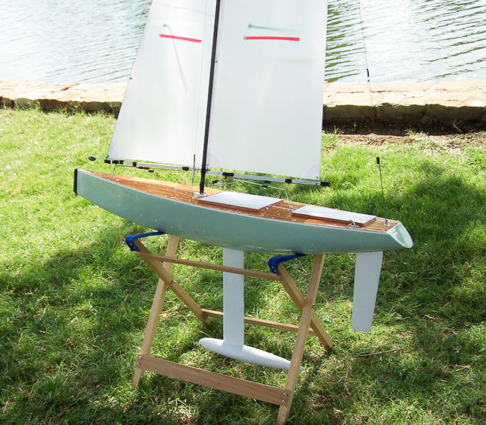 A grey and white with wooden deck Racing Sparrow model yacht built by Eric Rosenbaum from the USA
