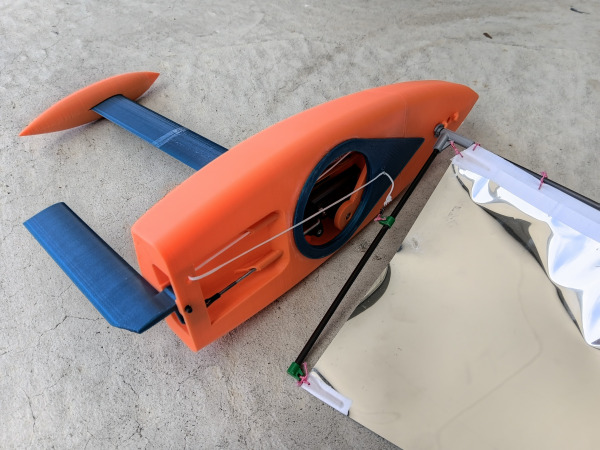 Rear view of Racing Sparrow Footy V1 3D printed hull showing keel, rudder and internal radio compartment