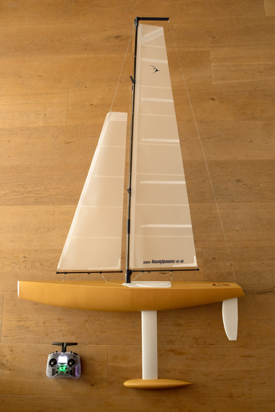 A yellow, one meter Racing Sparrow made with 3D printing technology. The boat is powerful, fast and easy to control with 2 servos. This is a really cheap way to build a large model sailboat.
