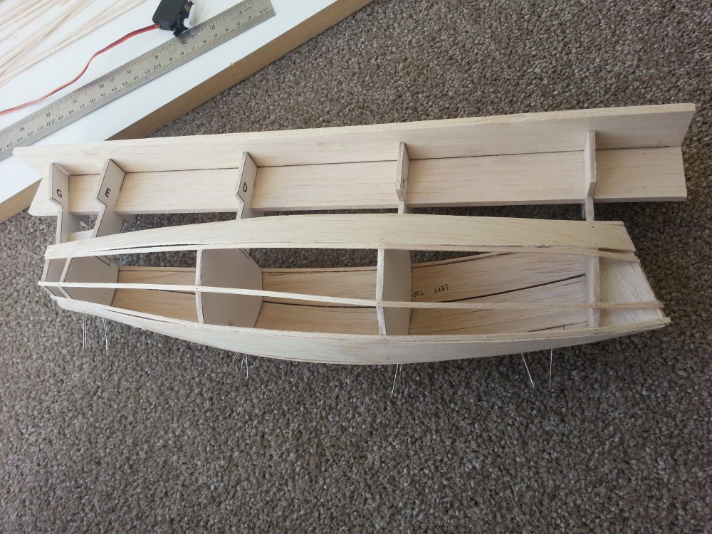 racing sparrow footy model yacht, strip planked